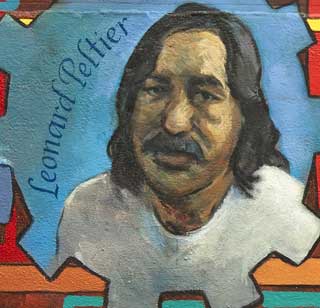Leonard Peltier in mural by Susan Greene
